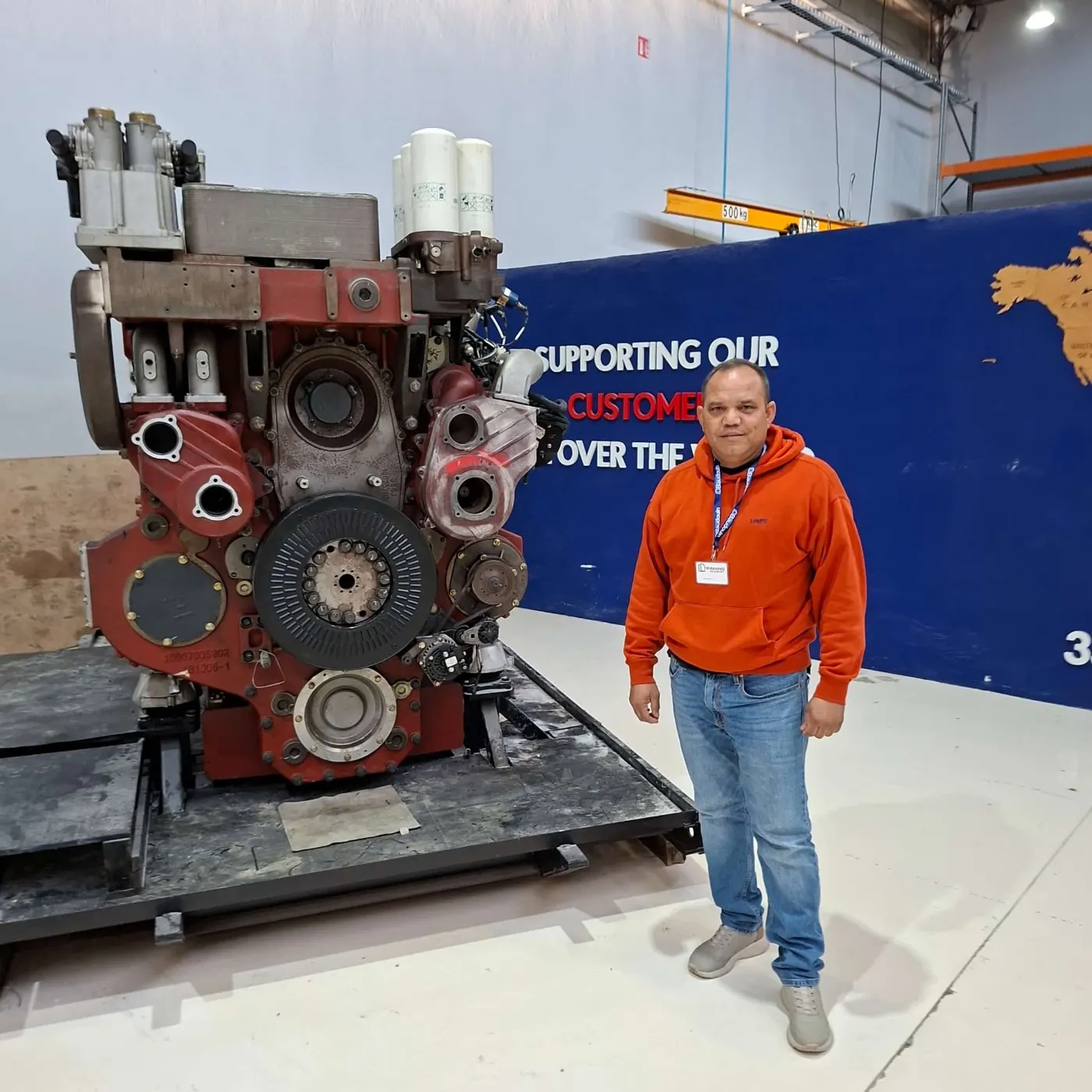 Technical training next to a marine diesel engine